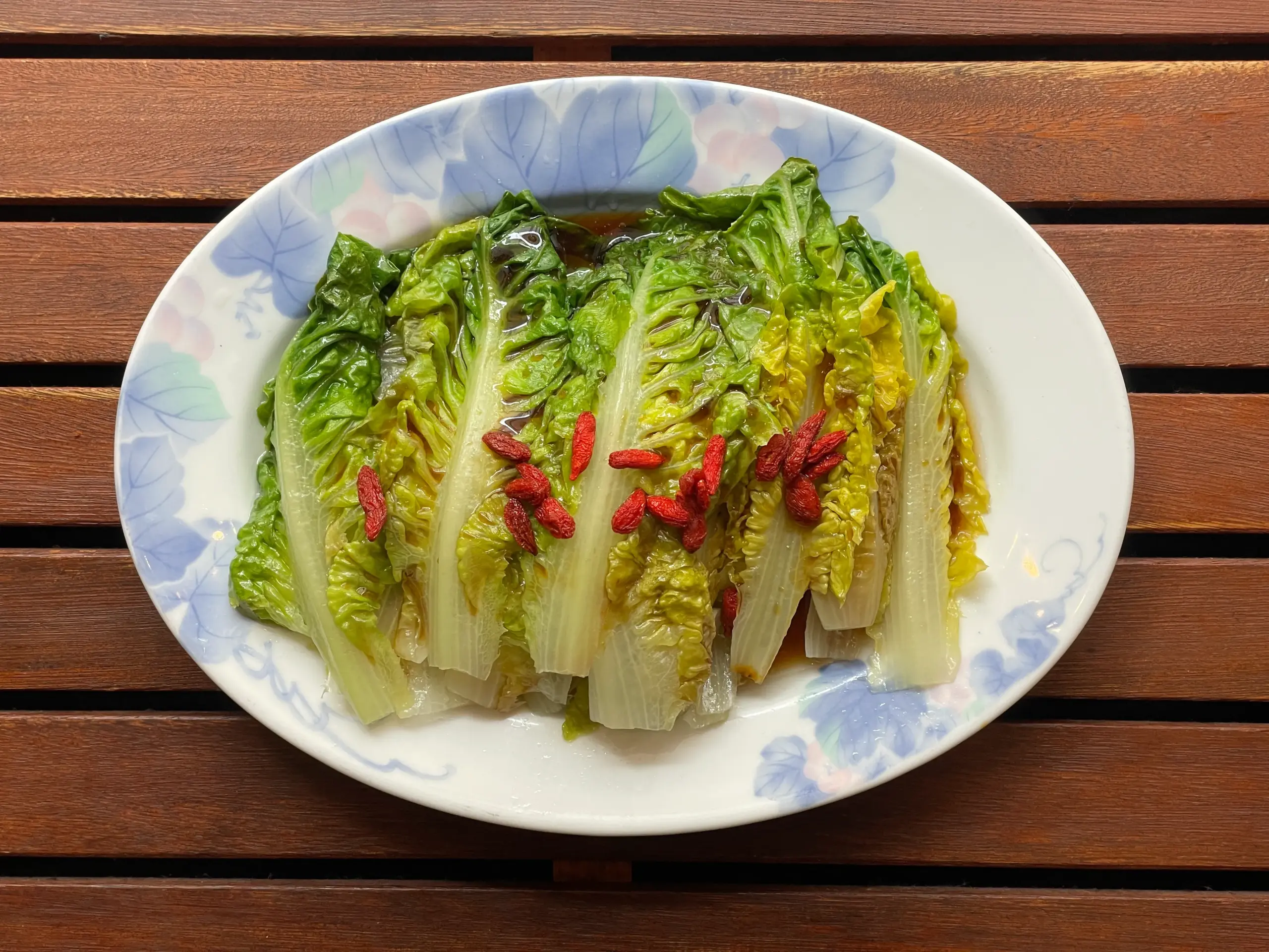 Steamed romaine lettuce Yung style — with garlic, goji berries and chilli oil